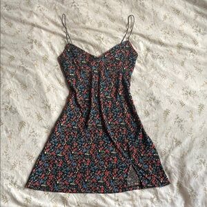 Berry colored Floral Black Dress size small in great condition never worn